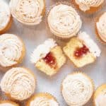 elderflower cupcakes with buttercream rosette ripped open with jam center