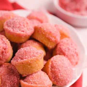 Strawberry Donut Muffins piled in a bowl