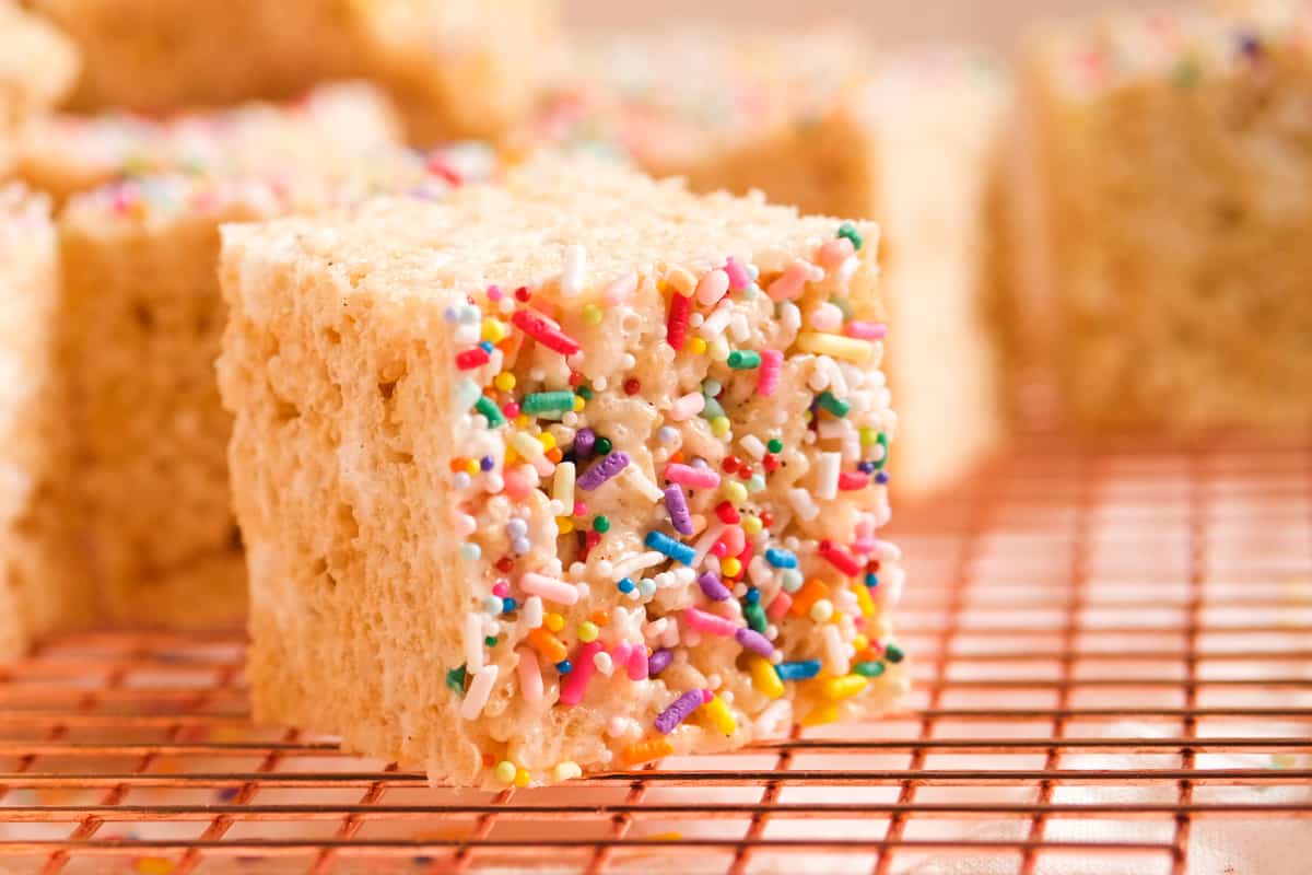 Brown Butter Rice Krispie Treat on it's side on a wire rack