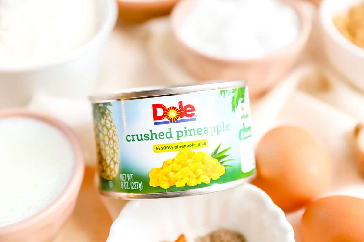 a can of dole crushed pineapple in the middle of other ingredients.