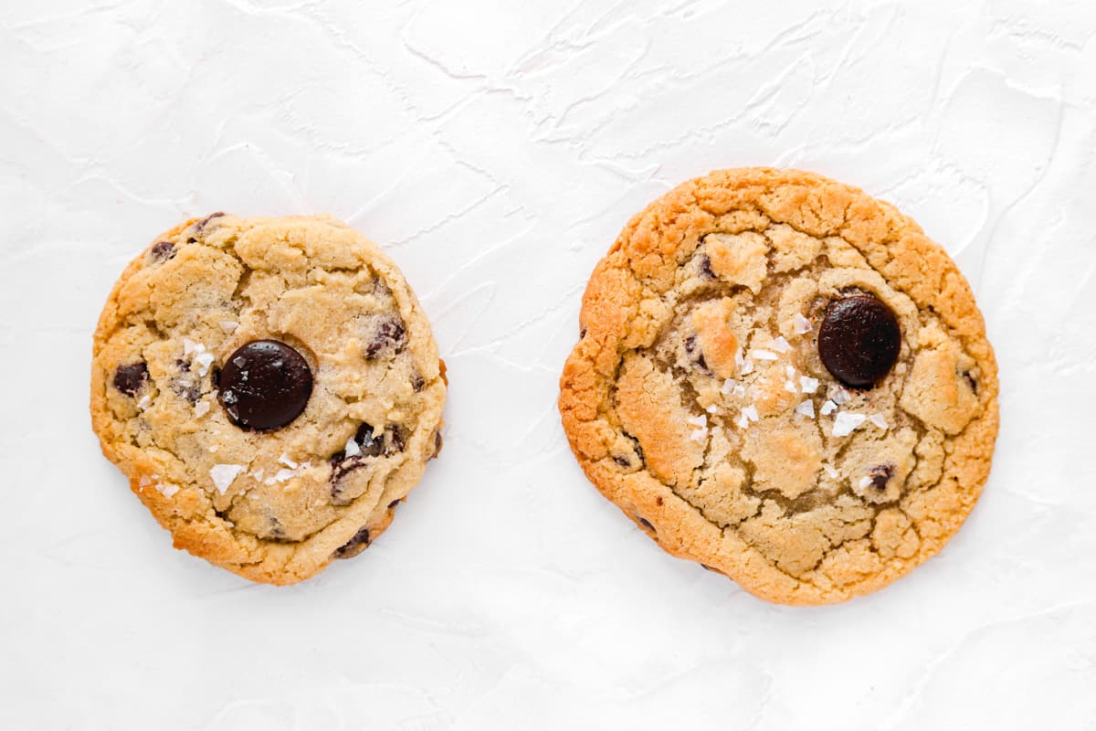 one cookie baked using convection baking and a flatter cookie using standard baking