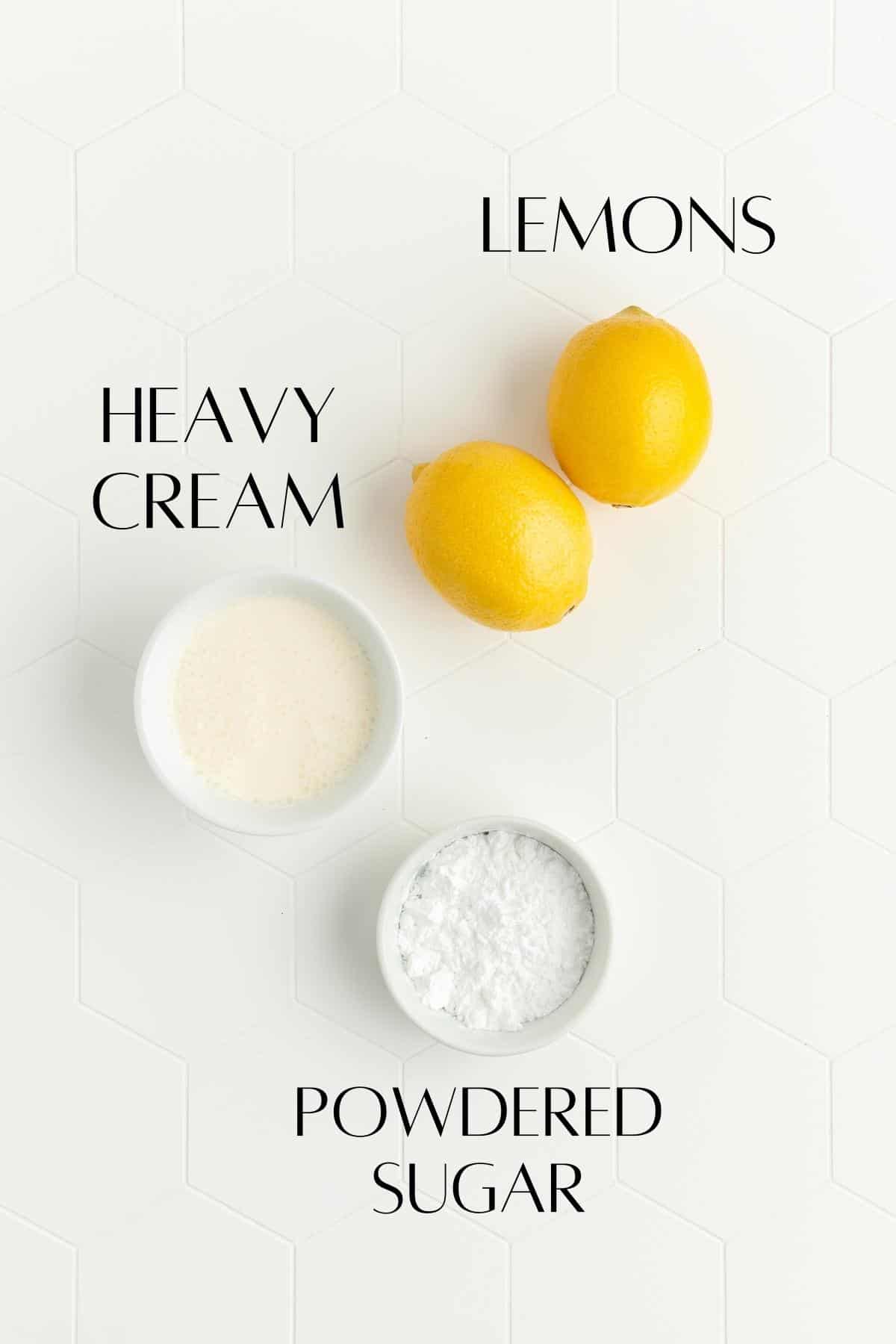 Ingredients for fresh lemon whipped cream in individual bowls on white background.