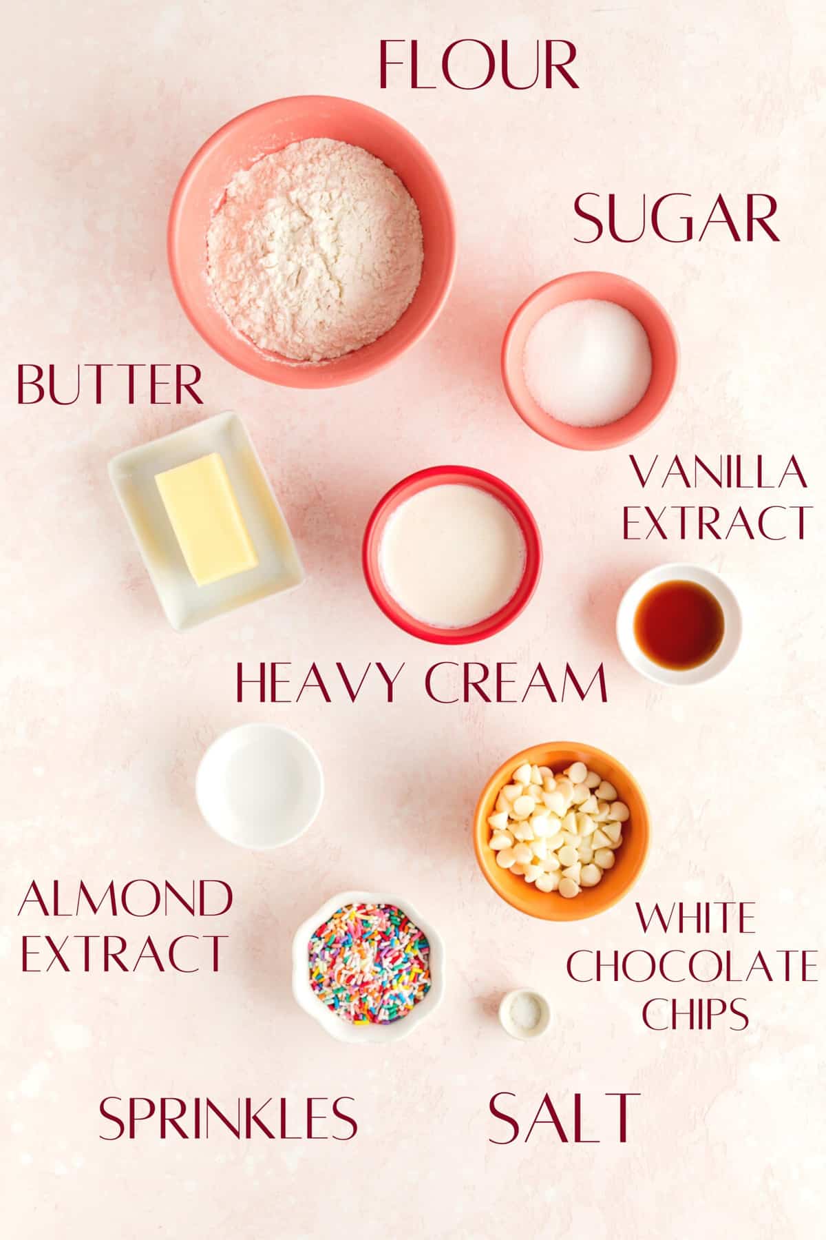 Ingredients in individual bowls for making edible Funfetti sugar cookie dough.