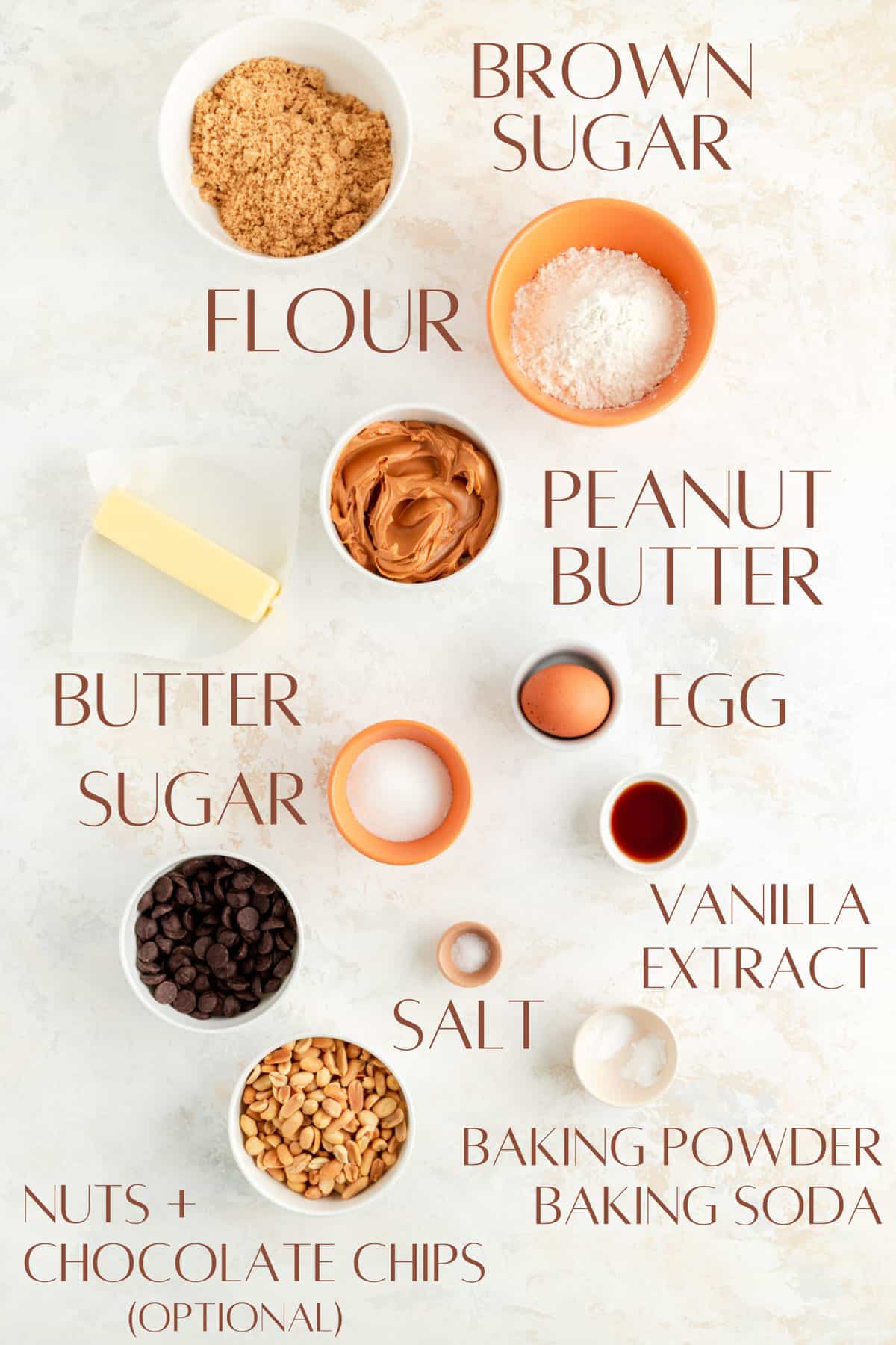 brown sugar, flour, sugar, peanut butter, butter, egg, vanilla, salt, leaveners, and inclusions in individual bowls.